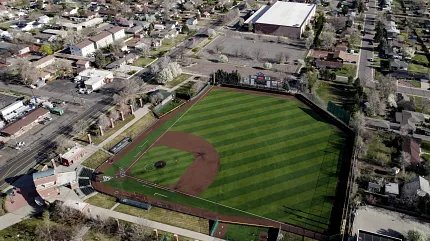 Scenic aerial shot of neighborhood baseball field Aerial view of a baseball field in a residential area