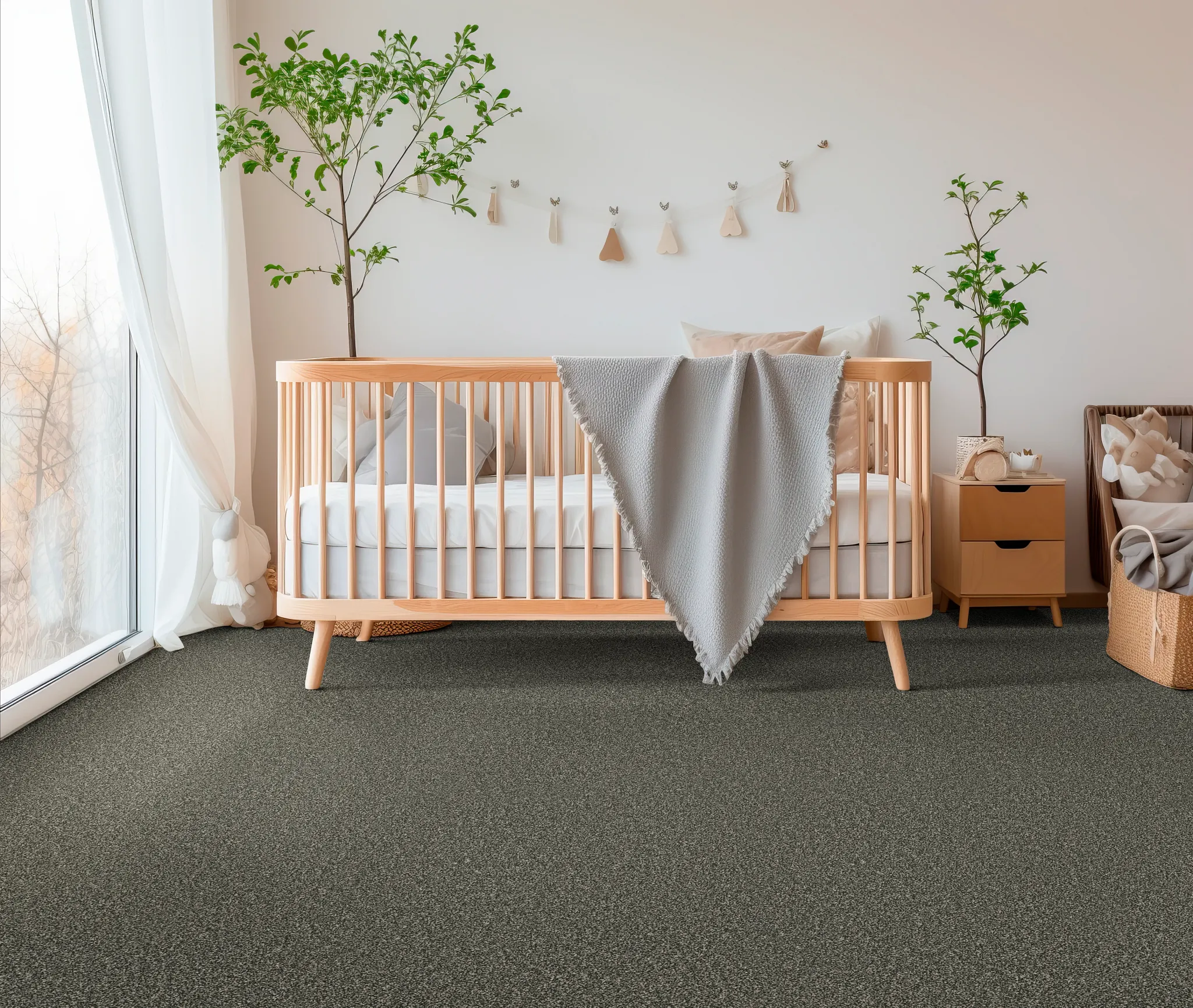 Cozy bedroom scene with a soft, textured carpet in a neutral beige tone, featuring a neatly made bed with a gray quilt and a wooden bench with a breakfast tray