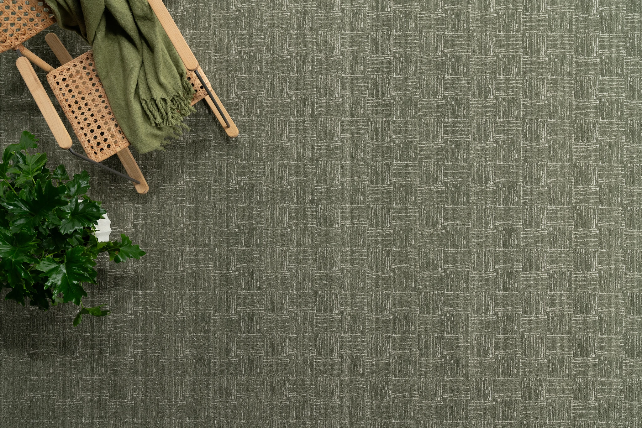 Textured gray carpet flooring with visible weave pattern