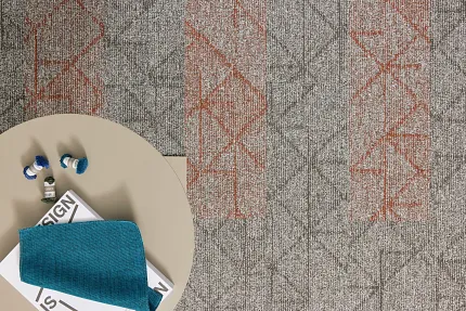 Geometric Pattern Commercial Carpet Tile in Gray and Orange with Teal Swatch.