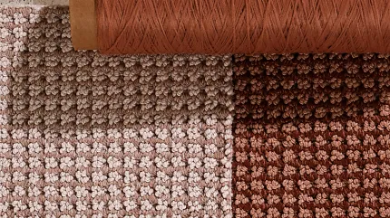 Textured Carpet Swatch in Beige, Taupe, and Brown Carpet swatch featuring textured patterns in shades of beige, taupe, and brown