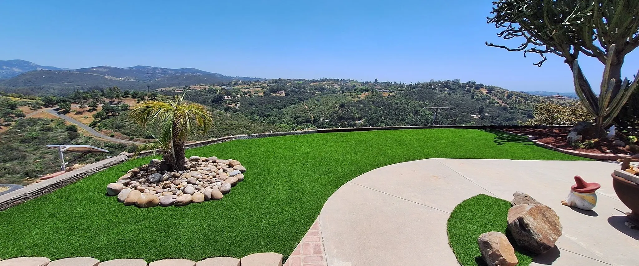 Scenic outdoor view with artificial grass and landscape