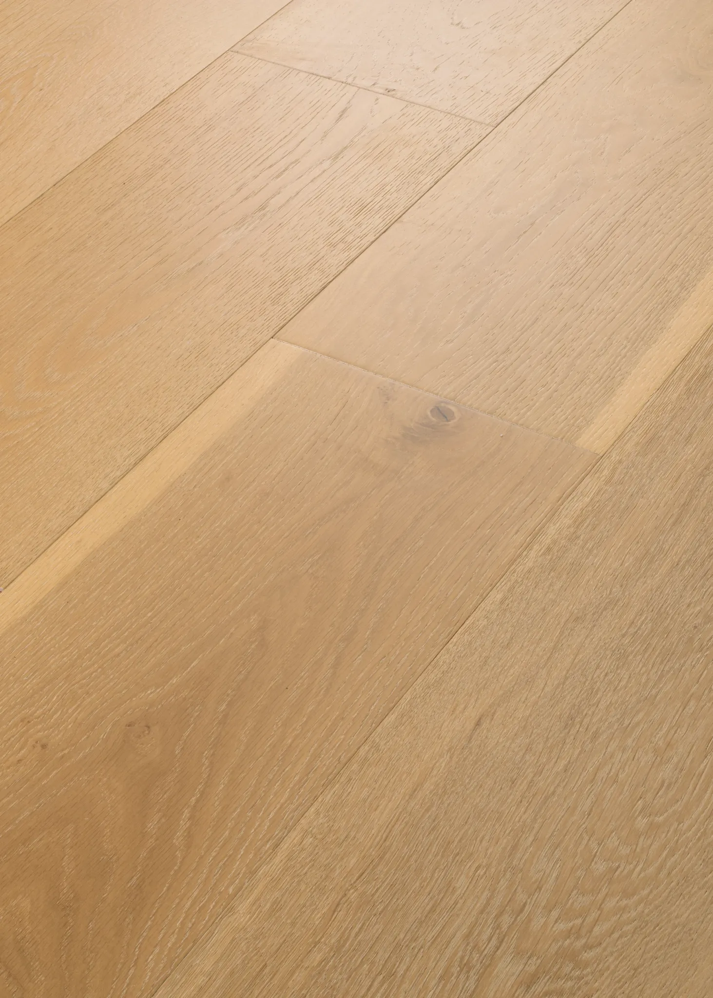Light oak engineered hardwood flooring with natural wood grain texture