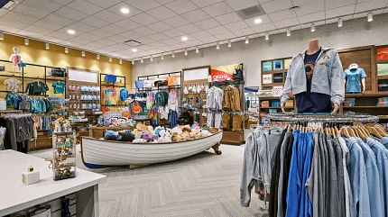 Stylish carpet tile flooring in retail environment Retail store with 9x36 inch carpet tile flooring