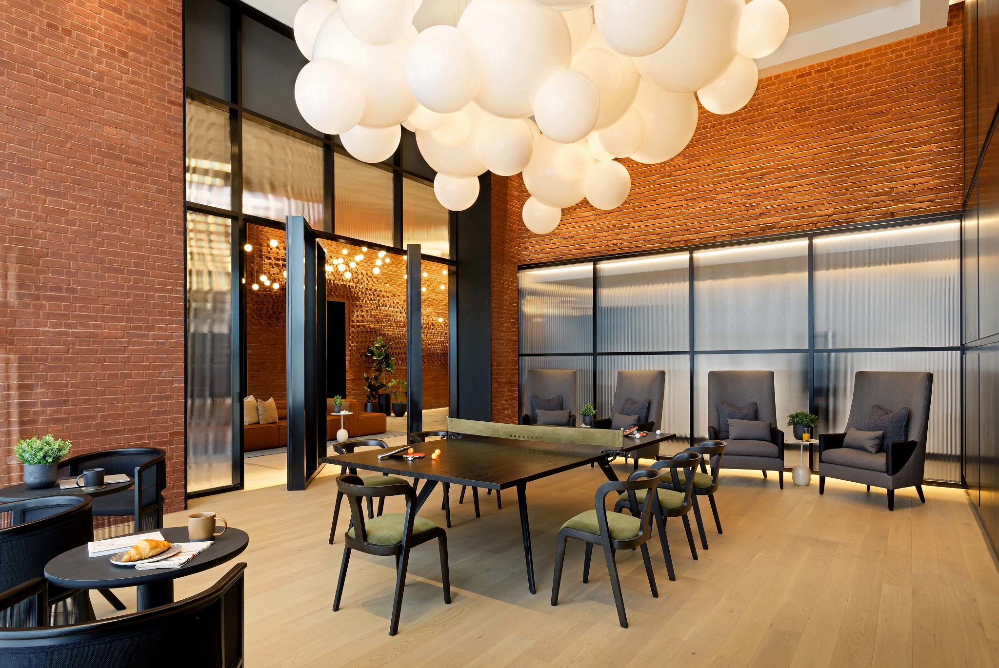 Modern hospitality facility with elegant seating and light wood flooring