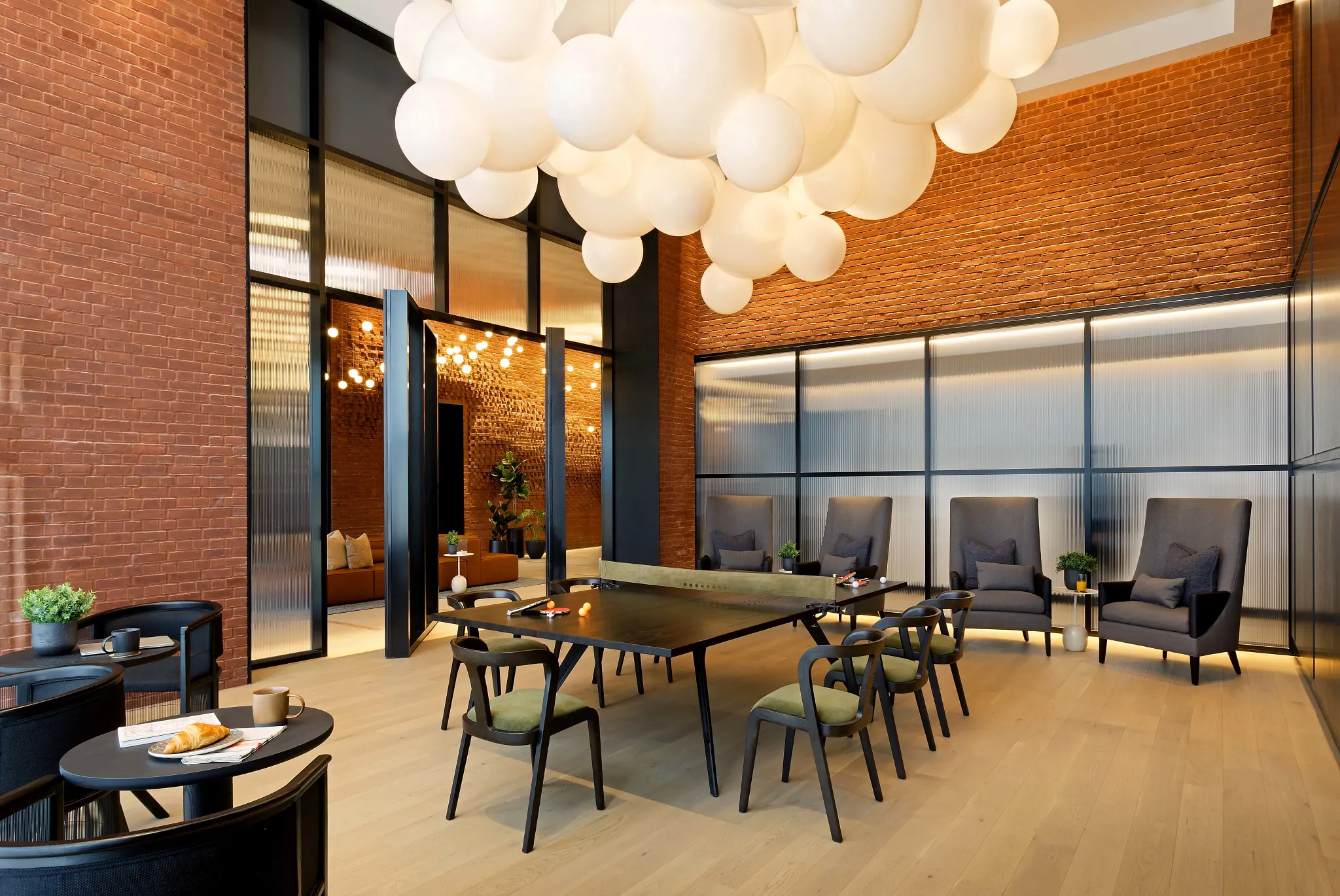 Modern hospitality facility with elegant seating and light wood flooring