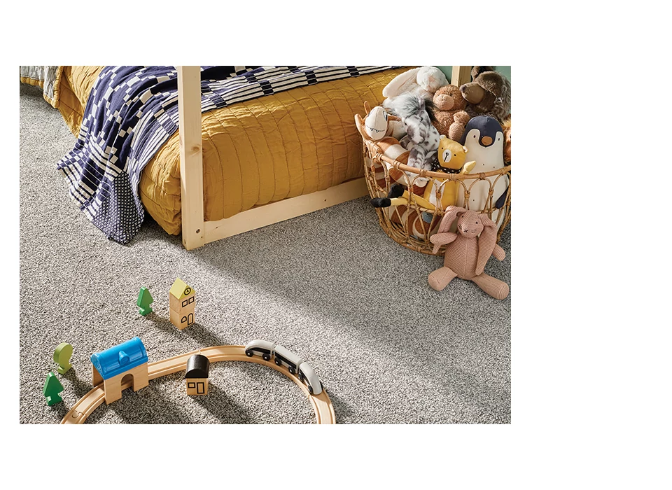 Children's bedroom with soft carpet and plushies