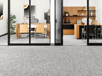 Gray Commercial Carpet Tile in Modern Office Space - 24x24 inch Breathe Tile in Oat and Knotted Tile in Argan