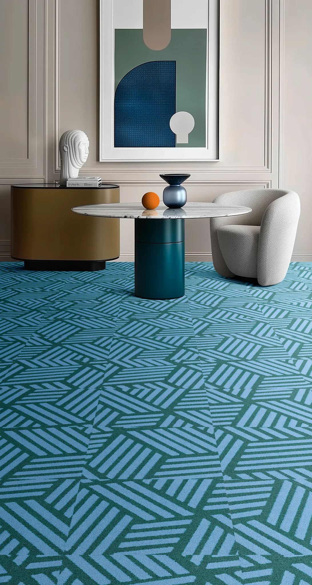Modern room with geometric patterned blue and green commercial carpet tile, featuring a marble table and abstract wall art