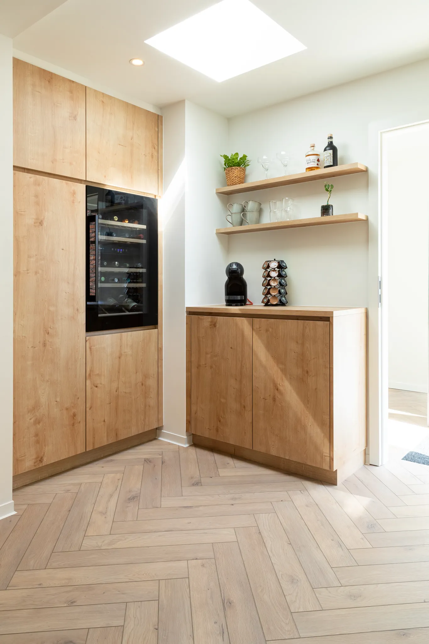 Country kitchen with wooden herringbone flooring from Coretec 