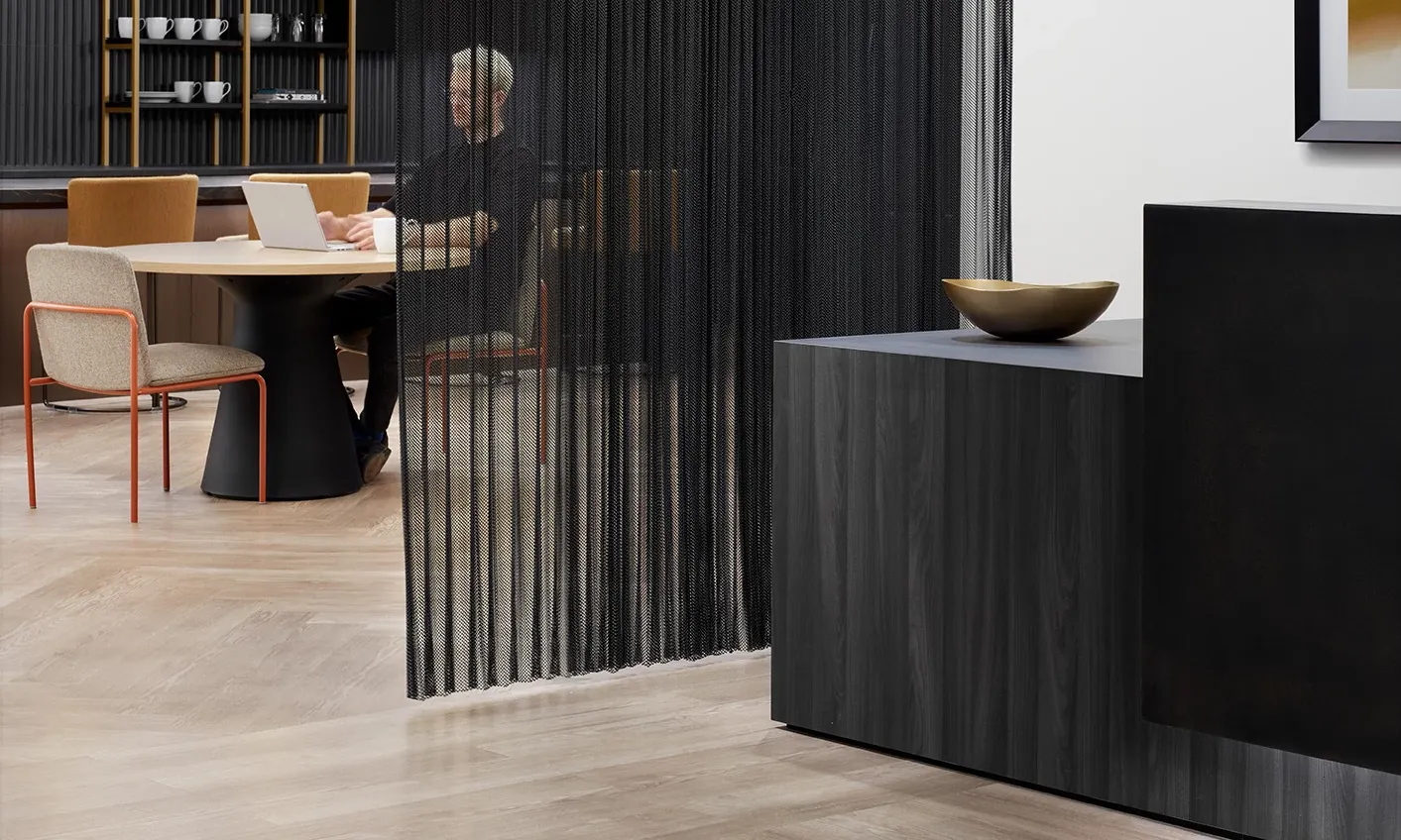 Modern workplace interior with heavy commercial luxury vinyl tile flooring, featuring a 48x6 inch dimension, and a stylish ceiling design.