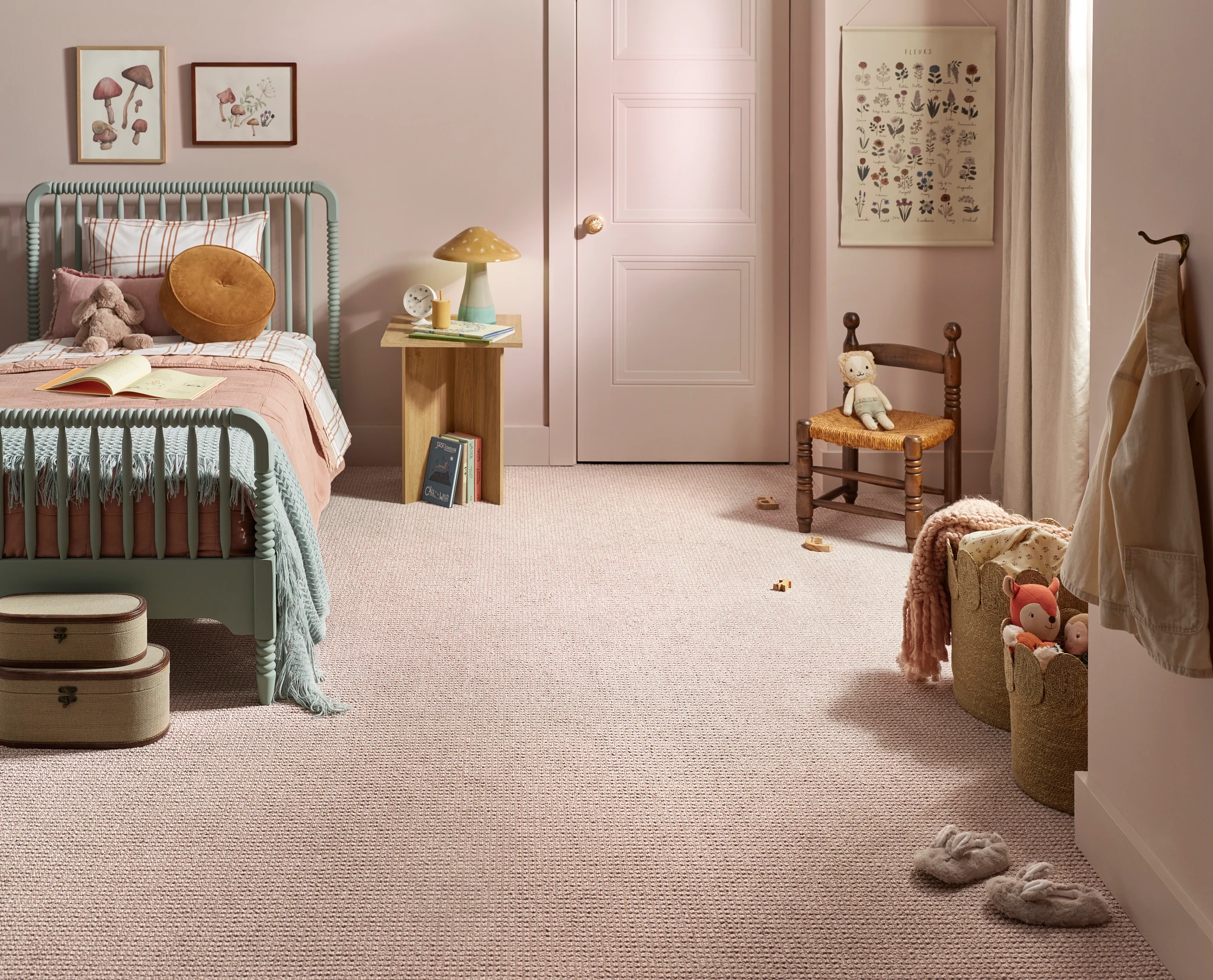 Cozy child's bedroom with a plush beige broadloom carpet flooring