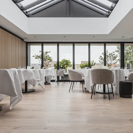Stylish vinyl flooring for contemporary dining spaces Modern dining area with luxury vinyl flooring and elegant seating