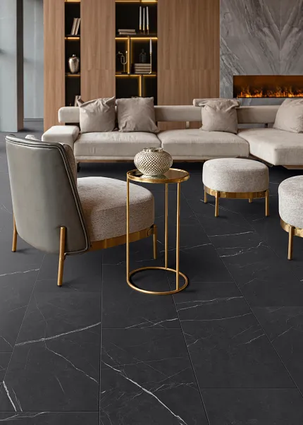 Black Stone Look Luxury Vinyl Tile Flooring in Modern Living Room - 23.62x11.81 inch Modern living room with black stone look luxury vinyl tile flooring, featuring a cozy seating area with beige furniture and gold accents
