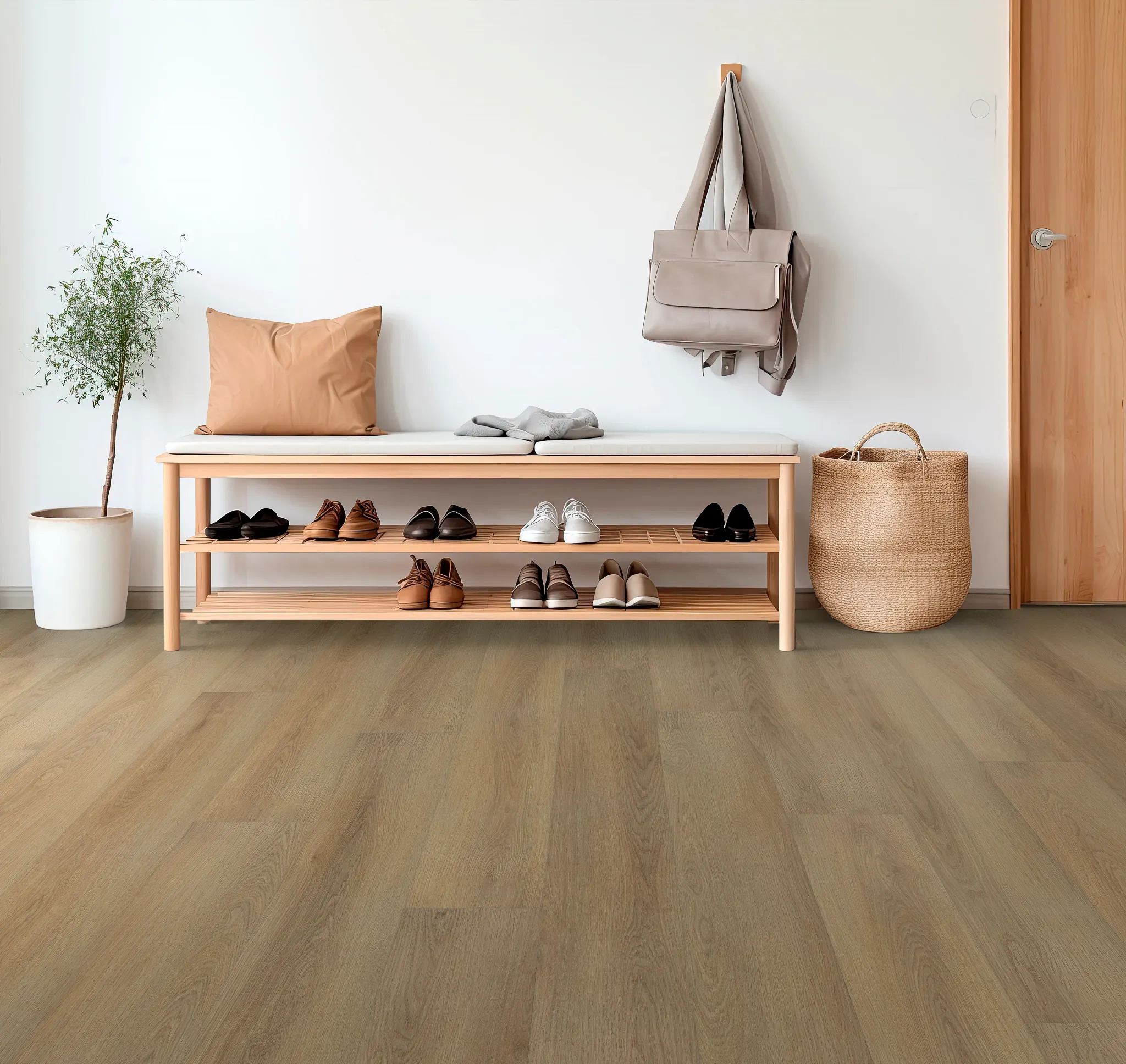 Entryway with WPC flooring featuring a natural wood finish, showcasing a bench with shoes and a potted plant