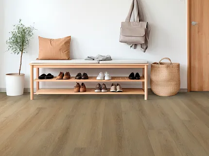 Durable WPC Flooring in Entryway with Natural Wood Finish - 60x9.06 inch Entryway with WPC flooring featuring a natural wood finish, showcasing a bench with shoes and a potted plant