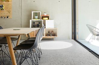 minimalist dining room area featuring coretec ceratouch vinyl floors