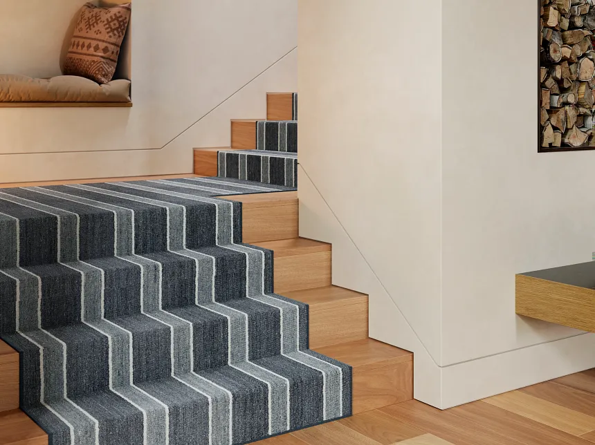 Stylish 100% Wool Carpet on Wooden Stairs - Blue and Gray Stripes Modern staircase with 100% wool carpet in blue and gray stripes