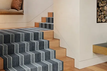 Stylish 100% Wool Carpet on Wooden Stairs - Blue and Gray Stripes Modern staircase with 100% wool carpet in blue and gray stripes