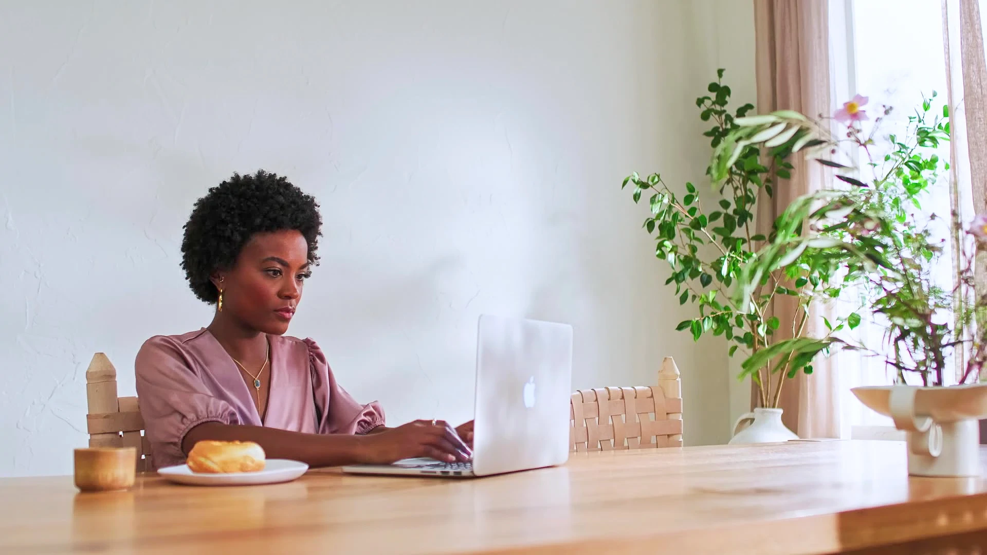 Modern home office with luxury vinyl flooring and natural light