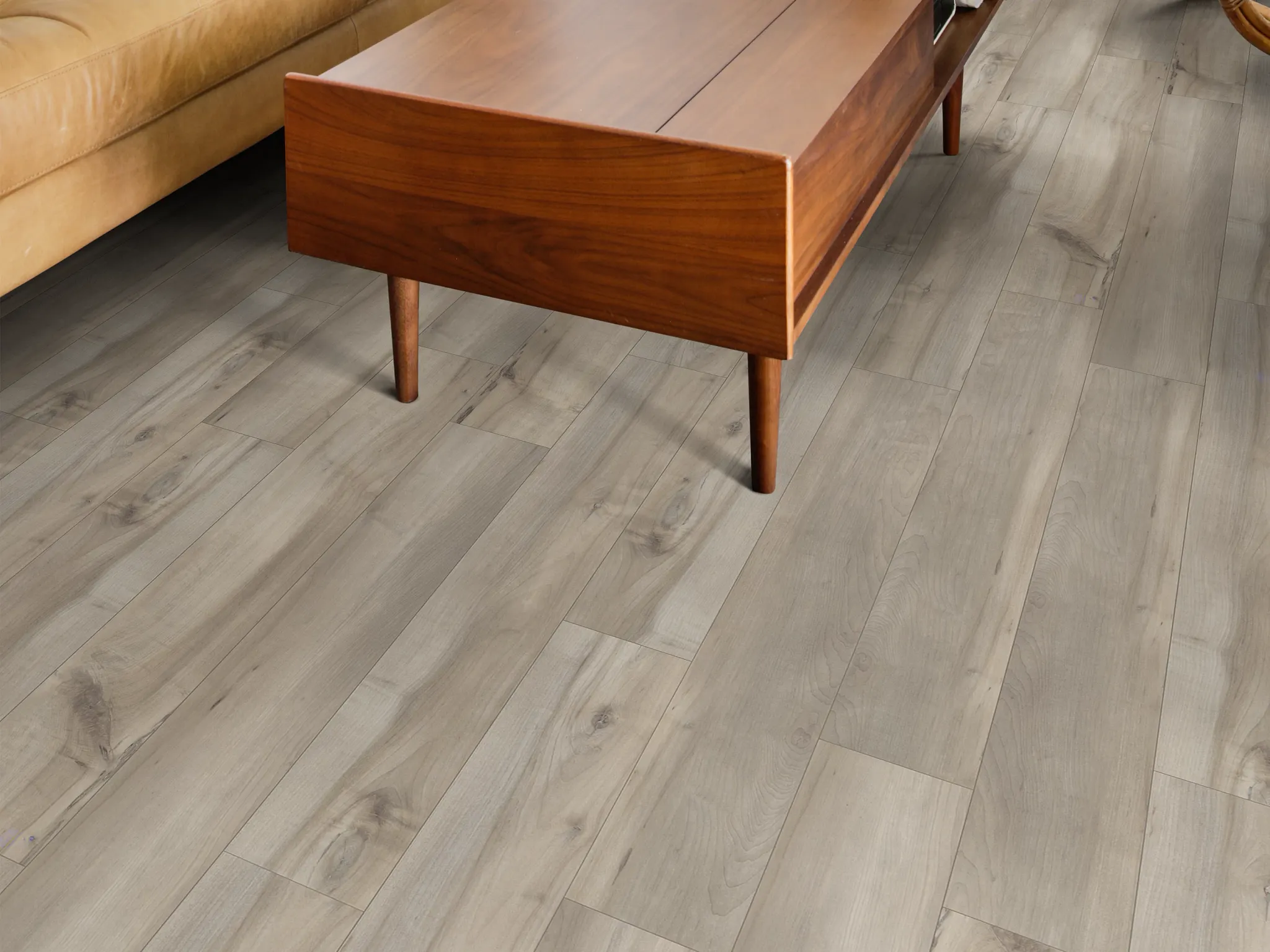Modern living room with light gray hardwood flooring and mid-century wooden coffee table