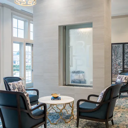 Stylish interior design with contemporary furniture and natural light Elegant seating area with modern decor and large windows