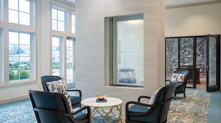 Stylish interior design with contemporary furniture and natural light Elegant seating area with modern decor and large windows
