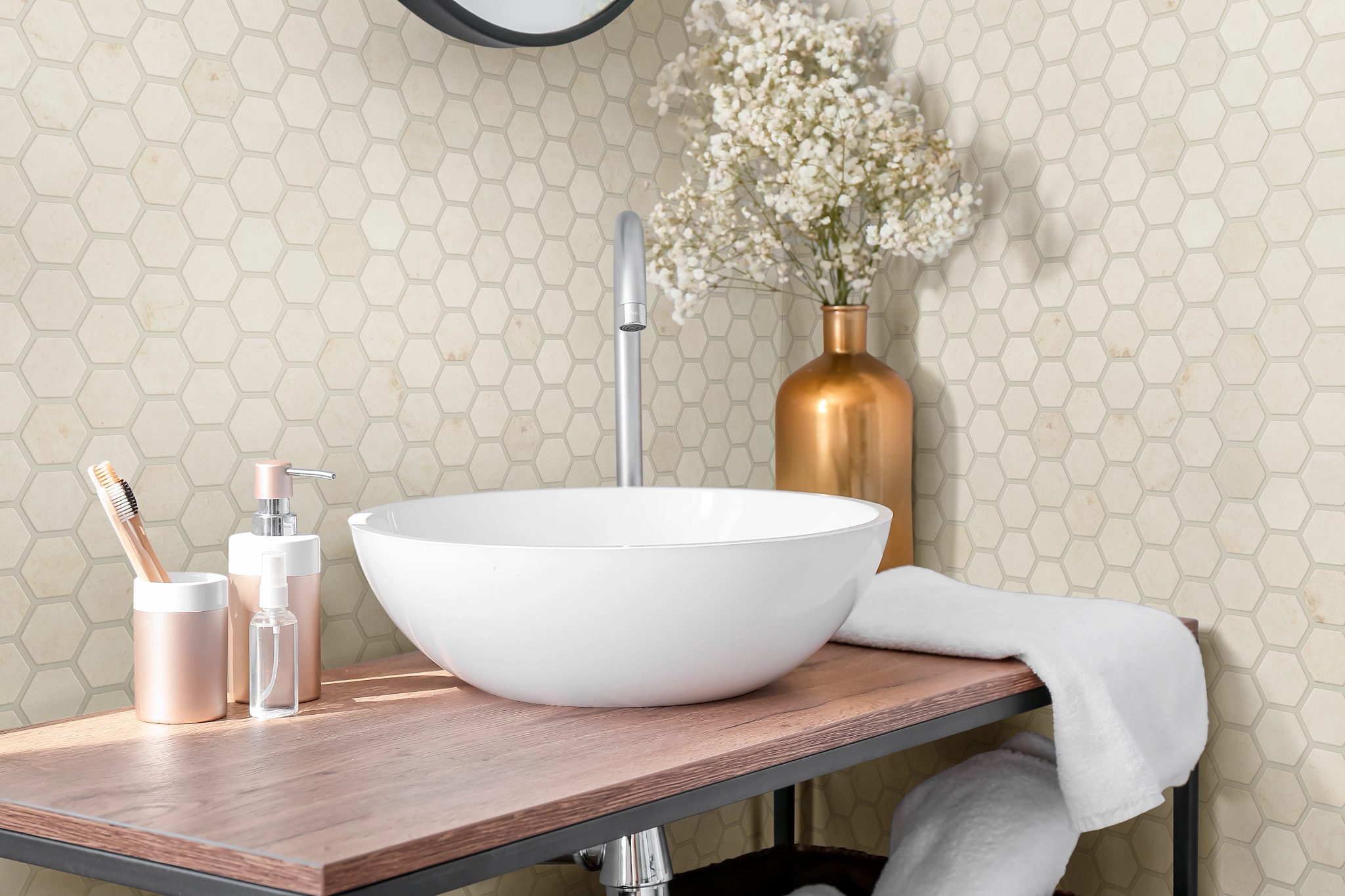 Hexagonal wall tile around a bathroom sink
