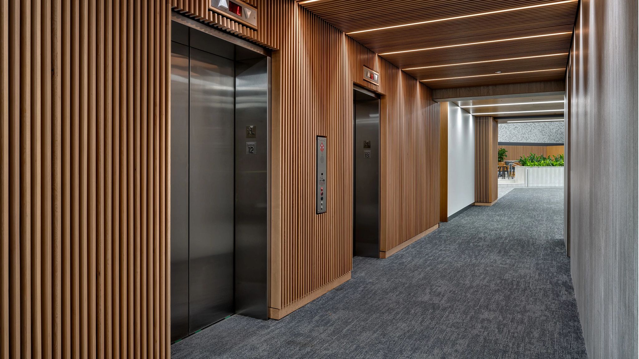 interior view of a commercial lobby showing elevators