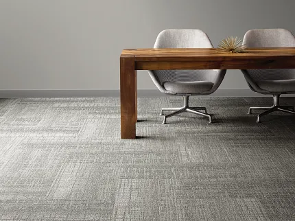 Stylish gray carpet tiles for contemporary office spaces Modern office with gray carpet tiles and wooden desk