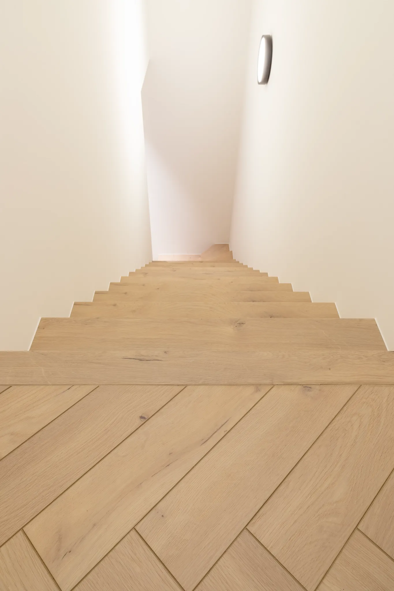 Light oak hardwood flooring on staircase