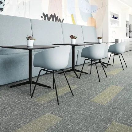 Education Facility with Commercial Carpet Tile Flooring in Gray and Beige Modern education facility with light blue chairs and tables on gray and beige commercial carpet tile flooring