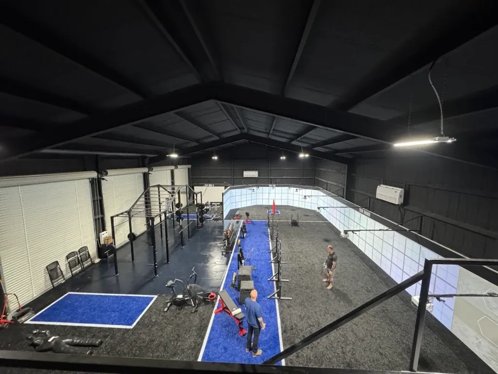 Gym interior with blue and gray flooring