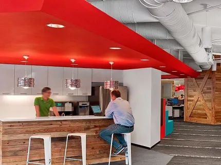 Contemporary Workplace Design with Commercial Carpet Tile Flooring Modern workplace kitchen area with red ceiling, wooden bar counter, and commercial carpet tile flooring