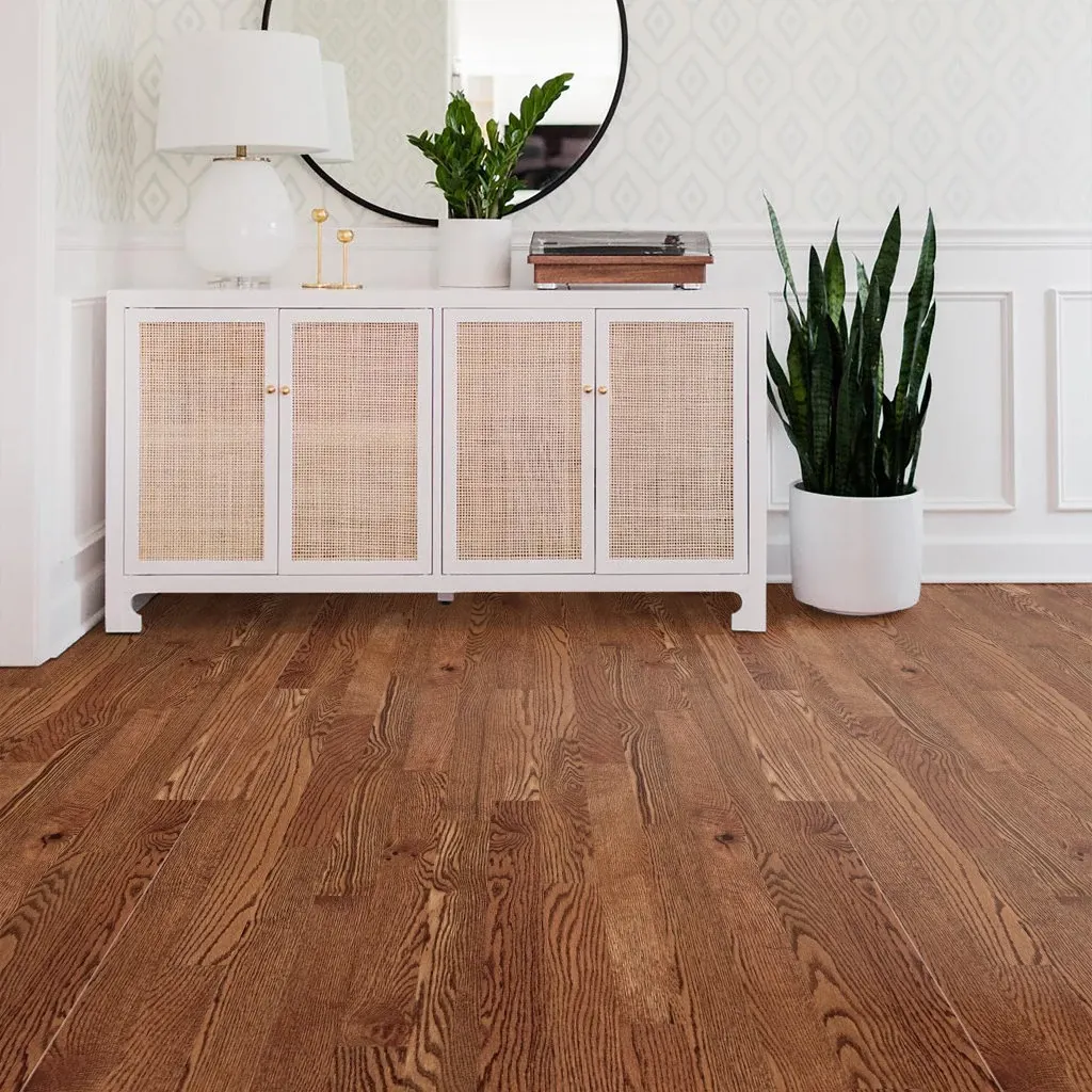 A cherry hardwood floor in an entryway