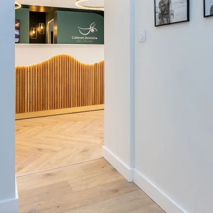 Modern dental office with herringbone wood flooring