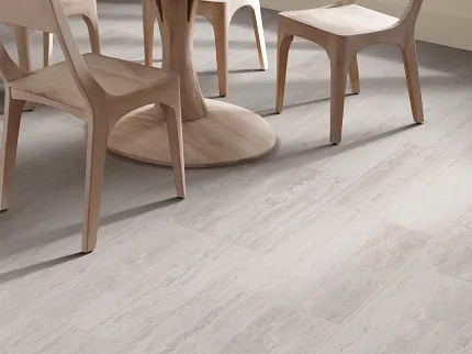 Light Gray Tile Flooring in Contemporary Dining Room Setting Modern dining room with light wood furniture and durable light gray tile flooring