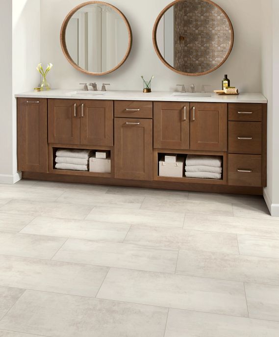 Luxurious spa bathroom with Paragon Tile Plus in the color Bone on the floor.