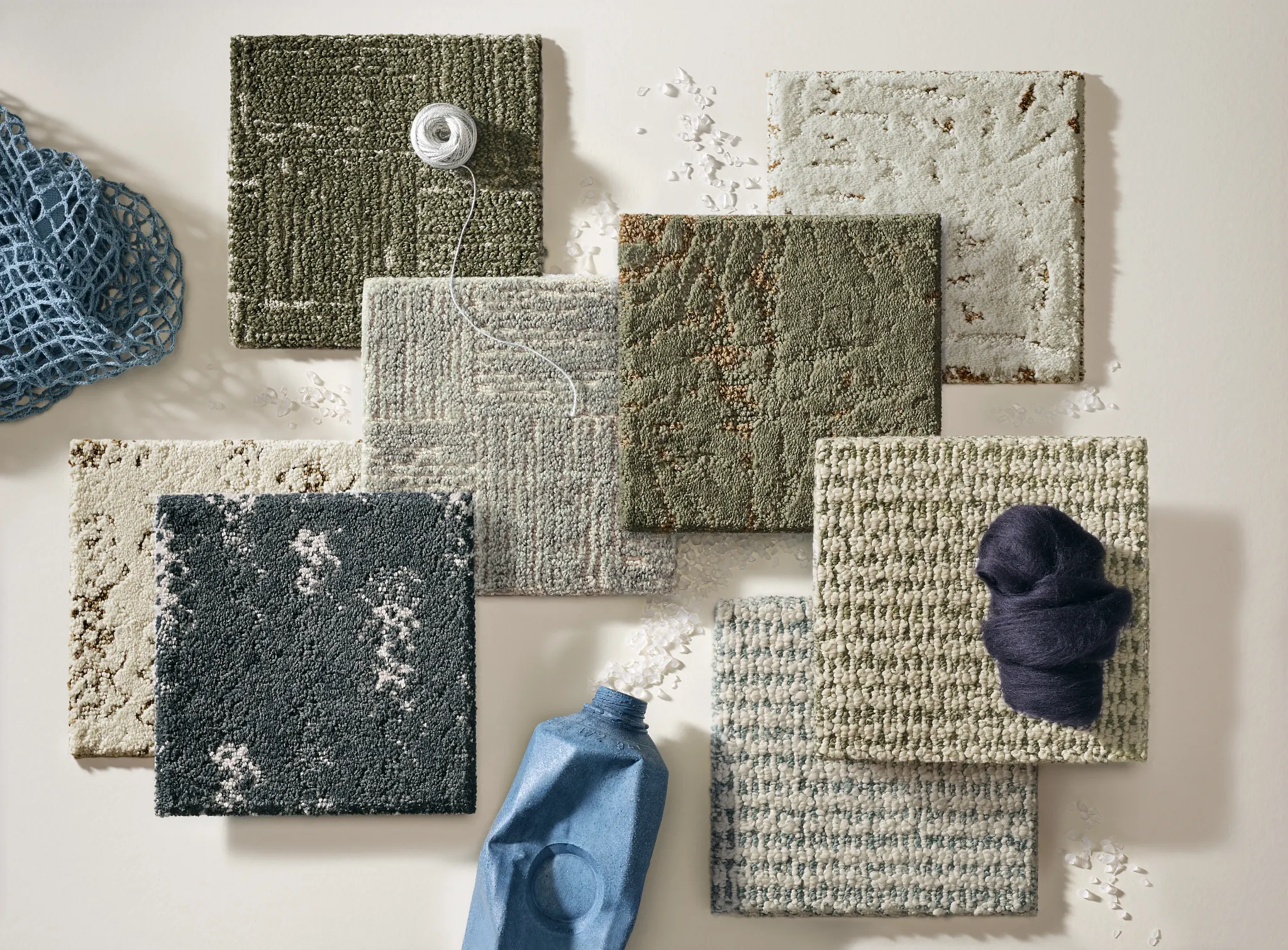 Circular display of carpet swatches in various colors including blue, green, beige, pink, and red