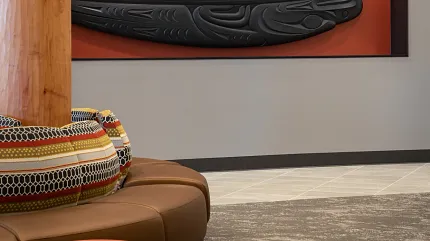 Stylish carpet flooring for contemporary spaces Modern lobby with patterned carpet and leather seating