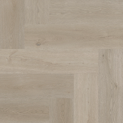 A light brown vinyl floor in herringbone pattern