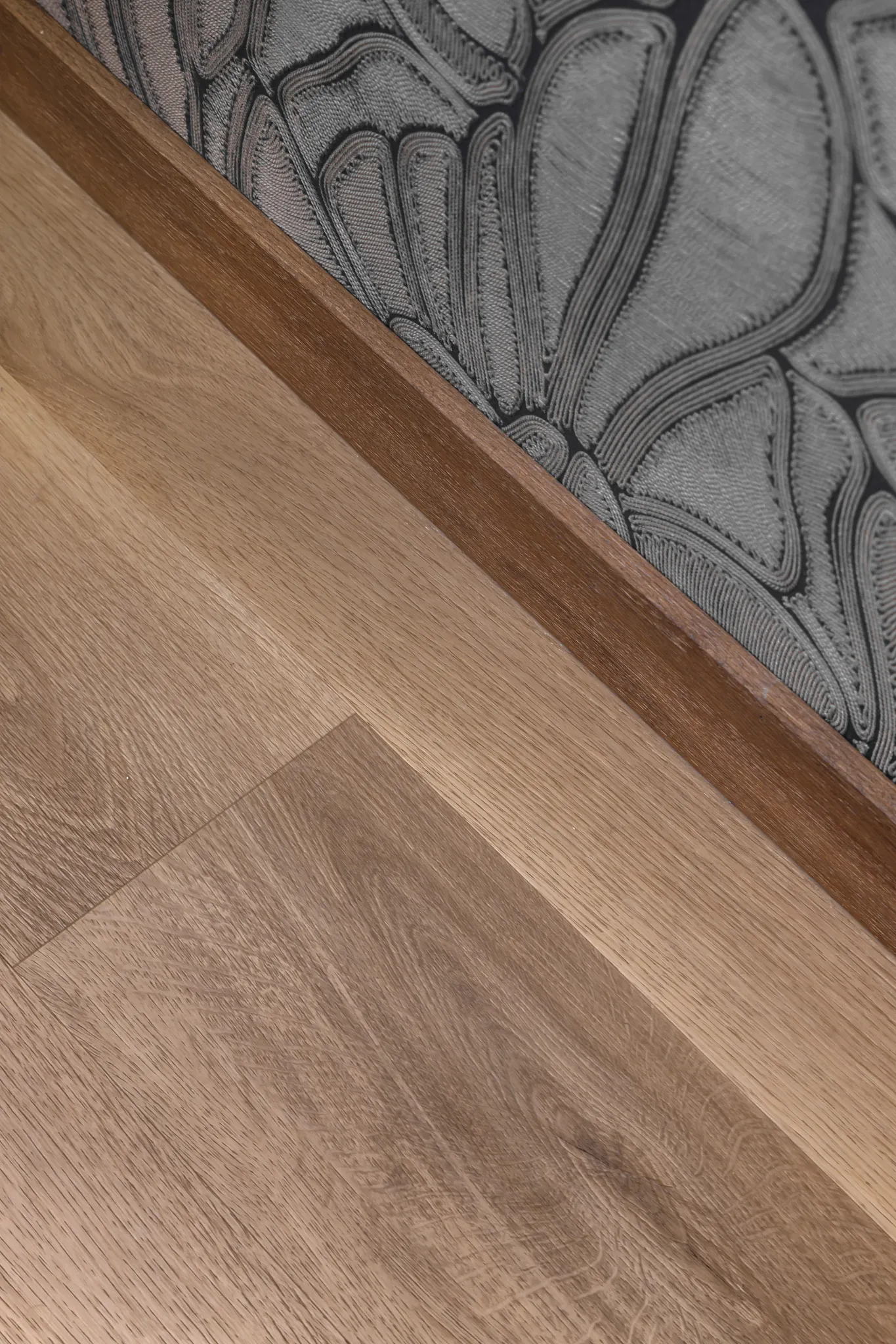 Close up floor with matching skirting board Coretec premium waterproof floors
