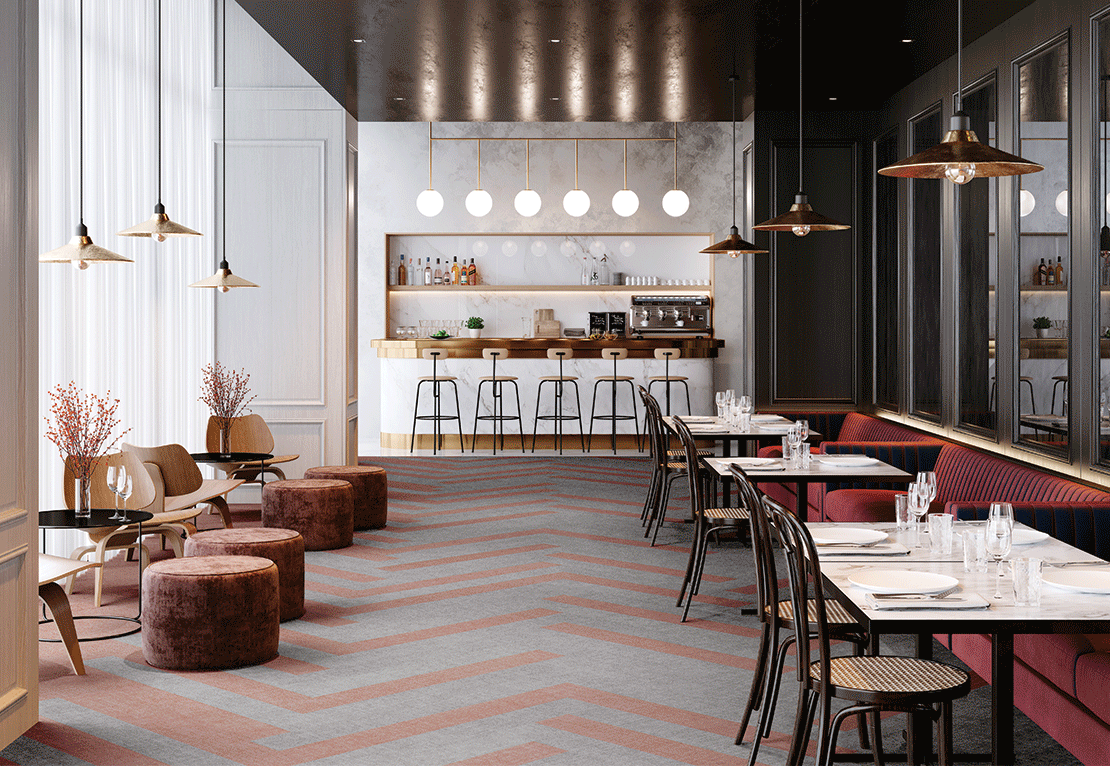 Hospitality space with chevron-patterned commercial carpet tile in gray and terracotta. Modern hospitality setting with chevron-patterned commercial carpet tile in shades of gray and terracotta, featuring a stylish bar area with pendant lighting and seating arrangements.
