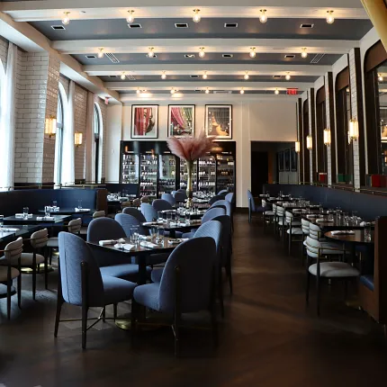 Sophisticated dining ambiance with premium hardwood floors Elegant restaurant interior with dark hardwood flooring