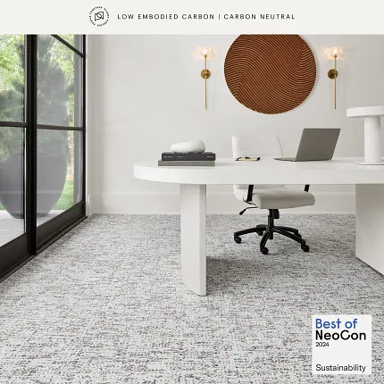 Contemporary office with sustainable gray commercial carpet tile flooring Modern office space with white furniture and gray commercial carpet tile