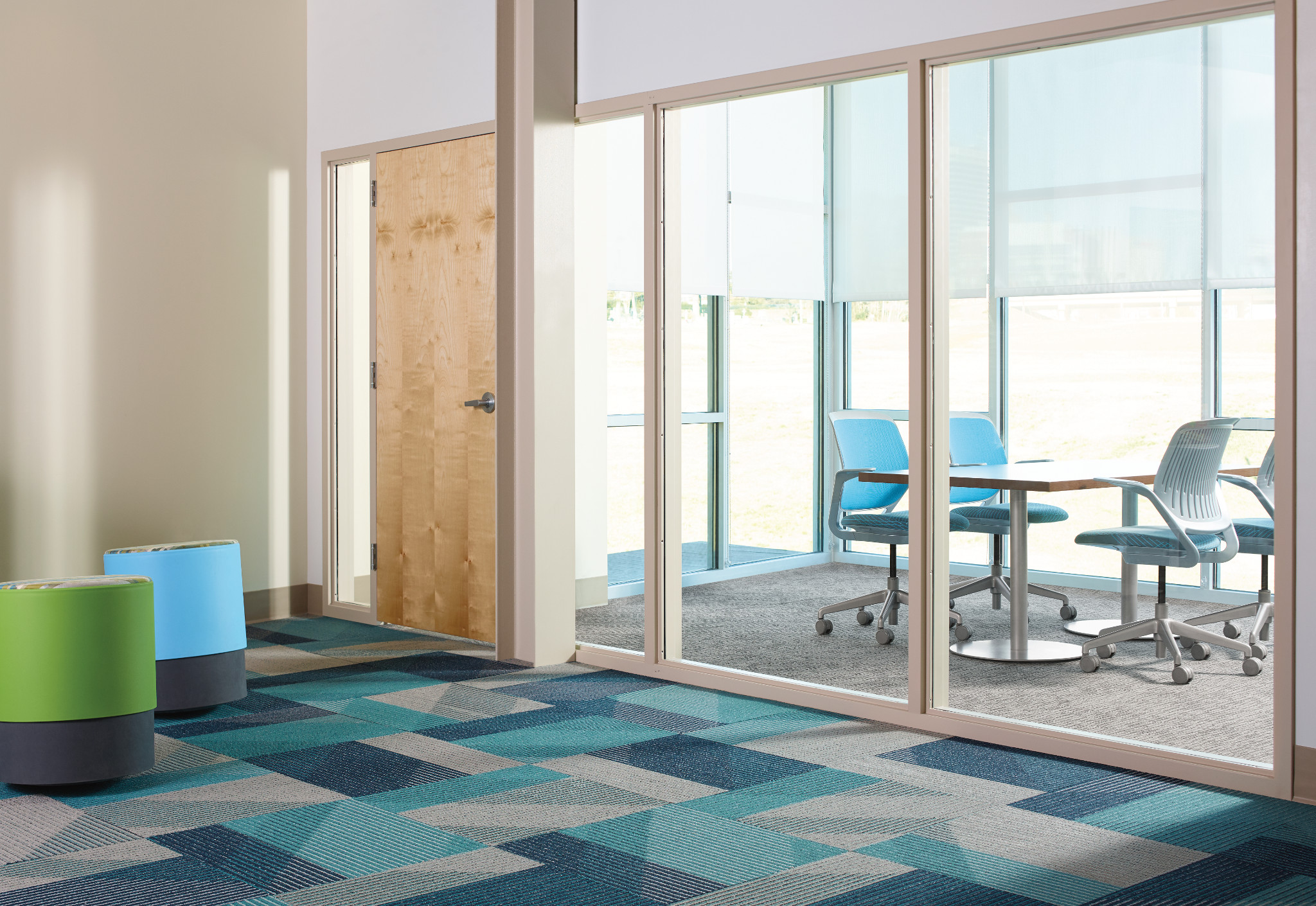 Colorful, geometric carpet tile in a modern office