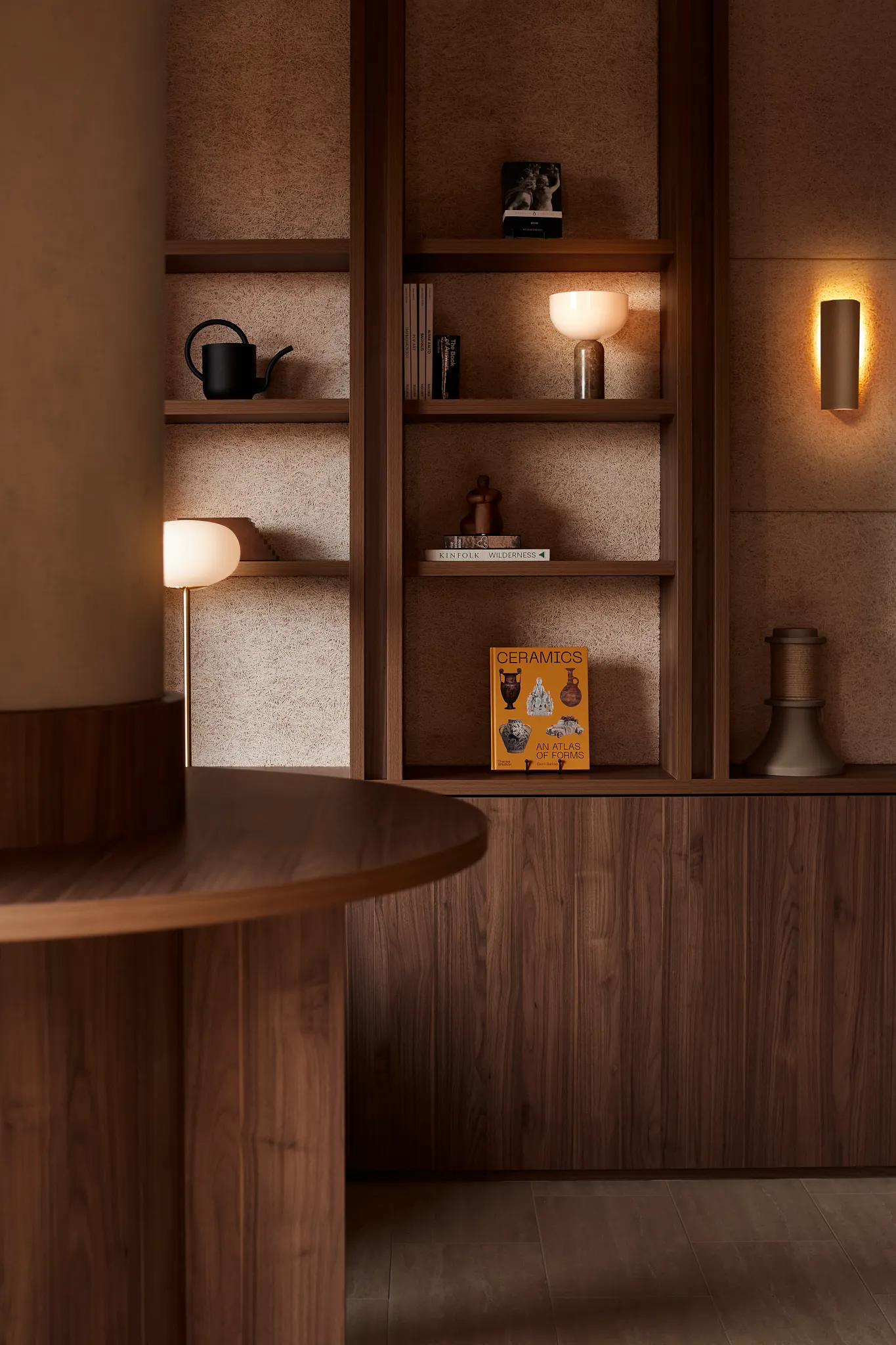 Cozy modern room with wooden shelves and warm lighting