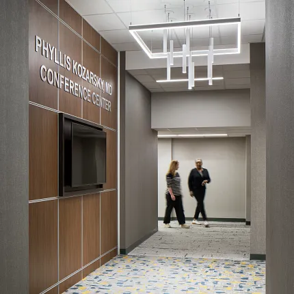 Stylish carpet design for professional spaces Conference center hallway with patterned carpet flooring