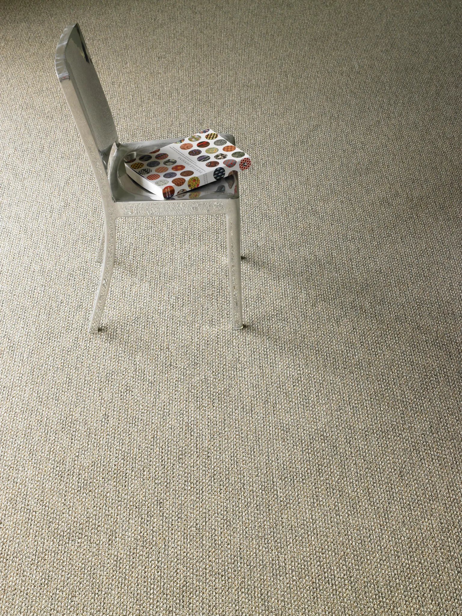 Neutral Commercial Broadloom Carpet with Metal Chair and Book - 12 ft Width