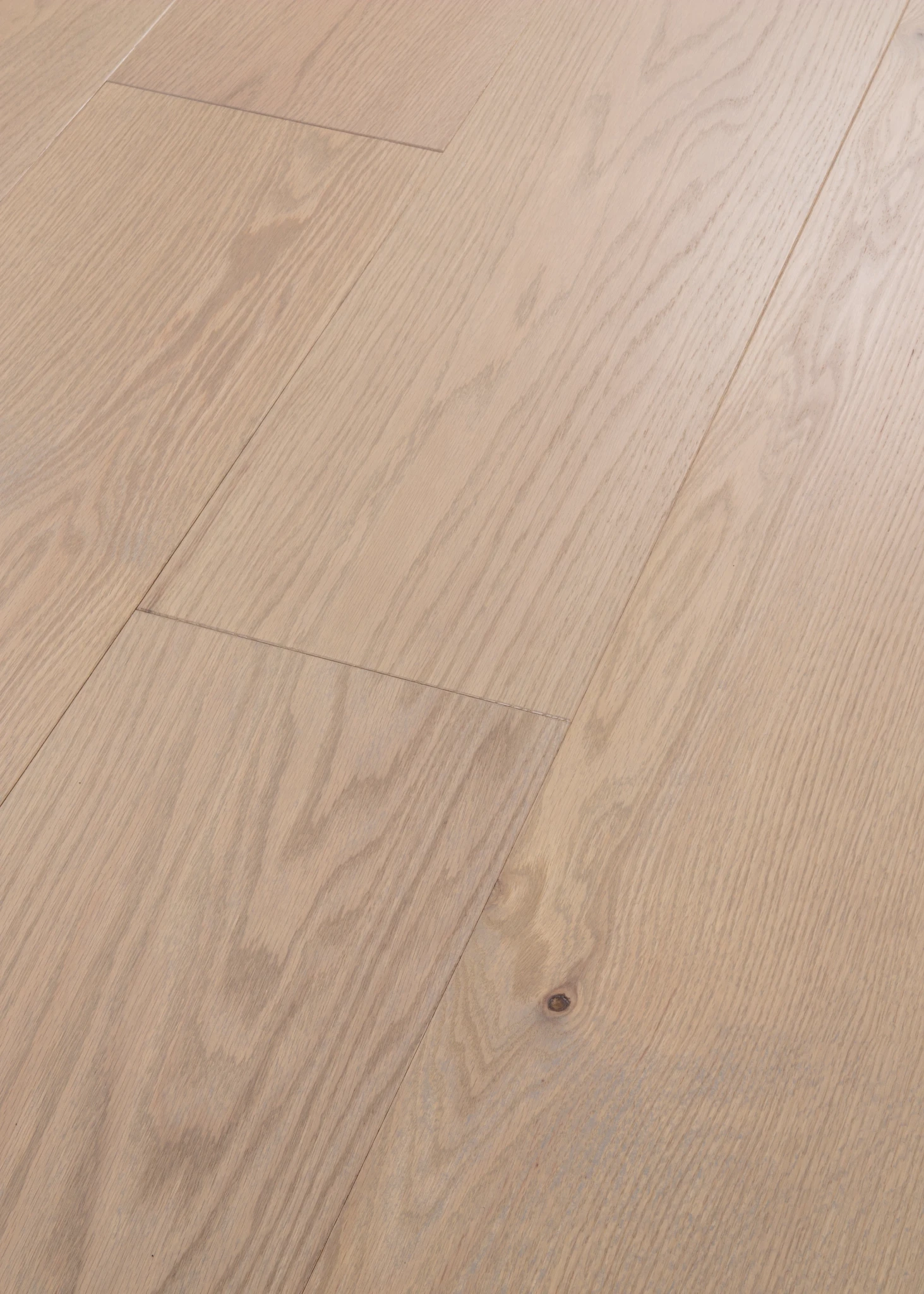 Light oak wood flooring with natural grain pattern